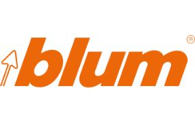 The image shows the blum logo in bold orange letters with a stylized upward arrow on the left side, representing innovation in Custom Storage Solutions.